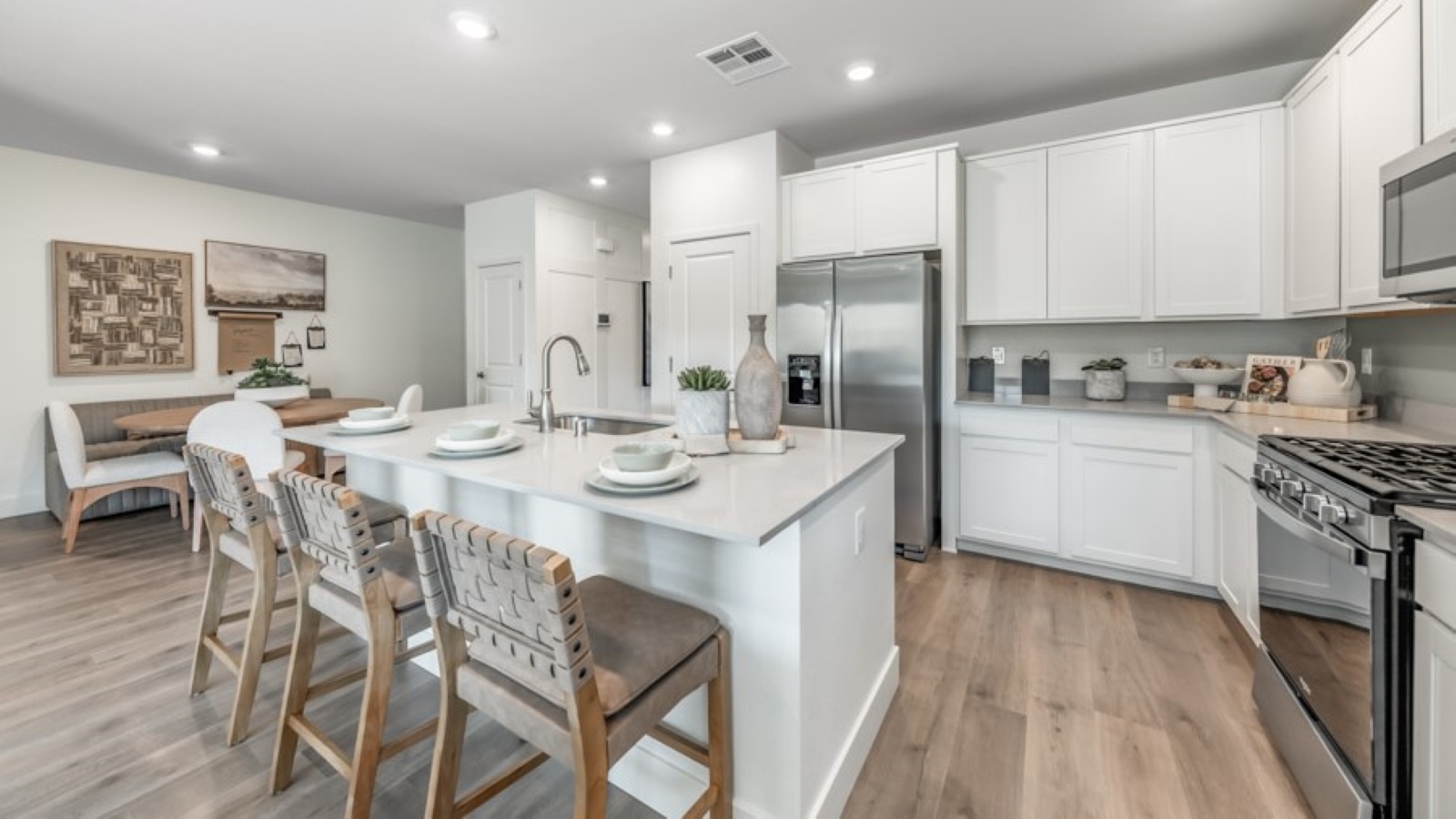 Modern shaker-style cabinets and stainless steel appliances