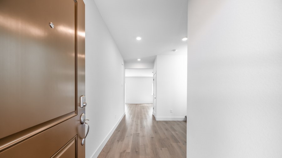 Stampede home entry leading to open-concept first floor