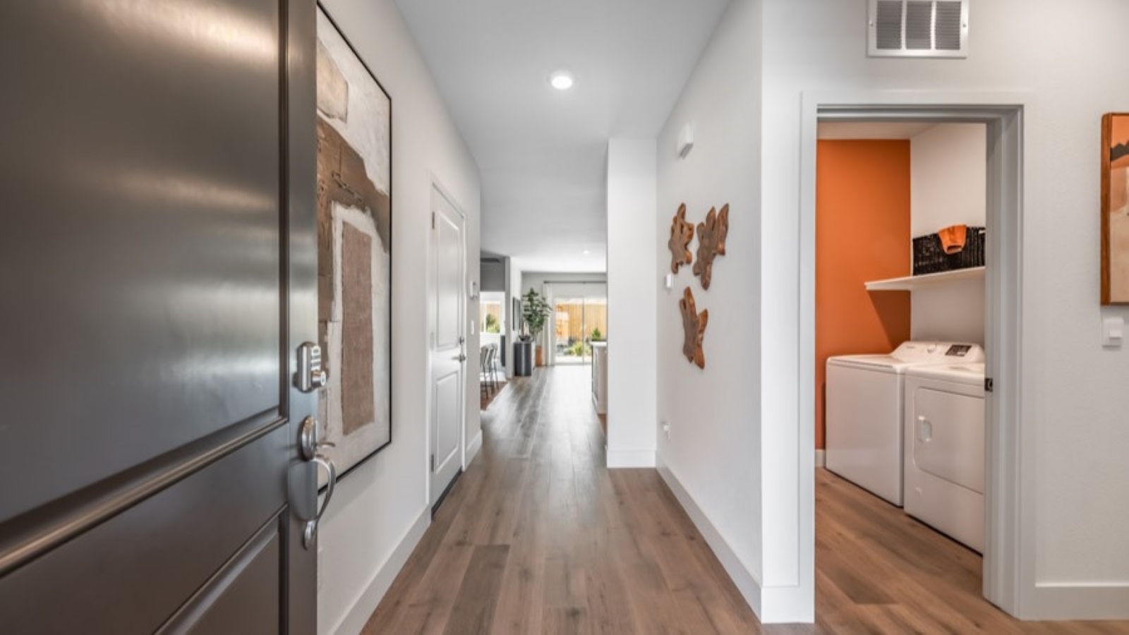 Entry to the Stampede floorplan with a bedroom and bathroom at the front of the home