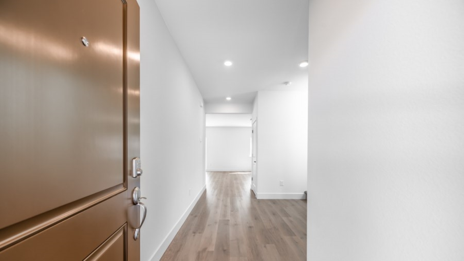 Stampede home entry leading to open-concept first floor