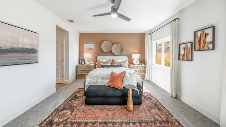 Bright primary bedroom with room for a large bed