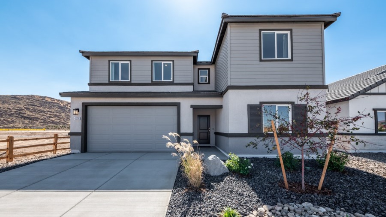 Two-story Mammoth floorplan with garage at the front of the home and stucco exterior