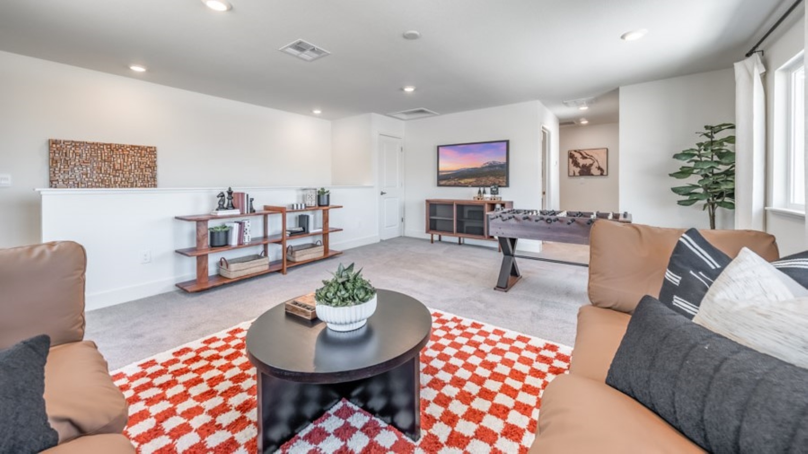 Game room on the second floor with space for sectional couch
