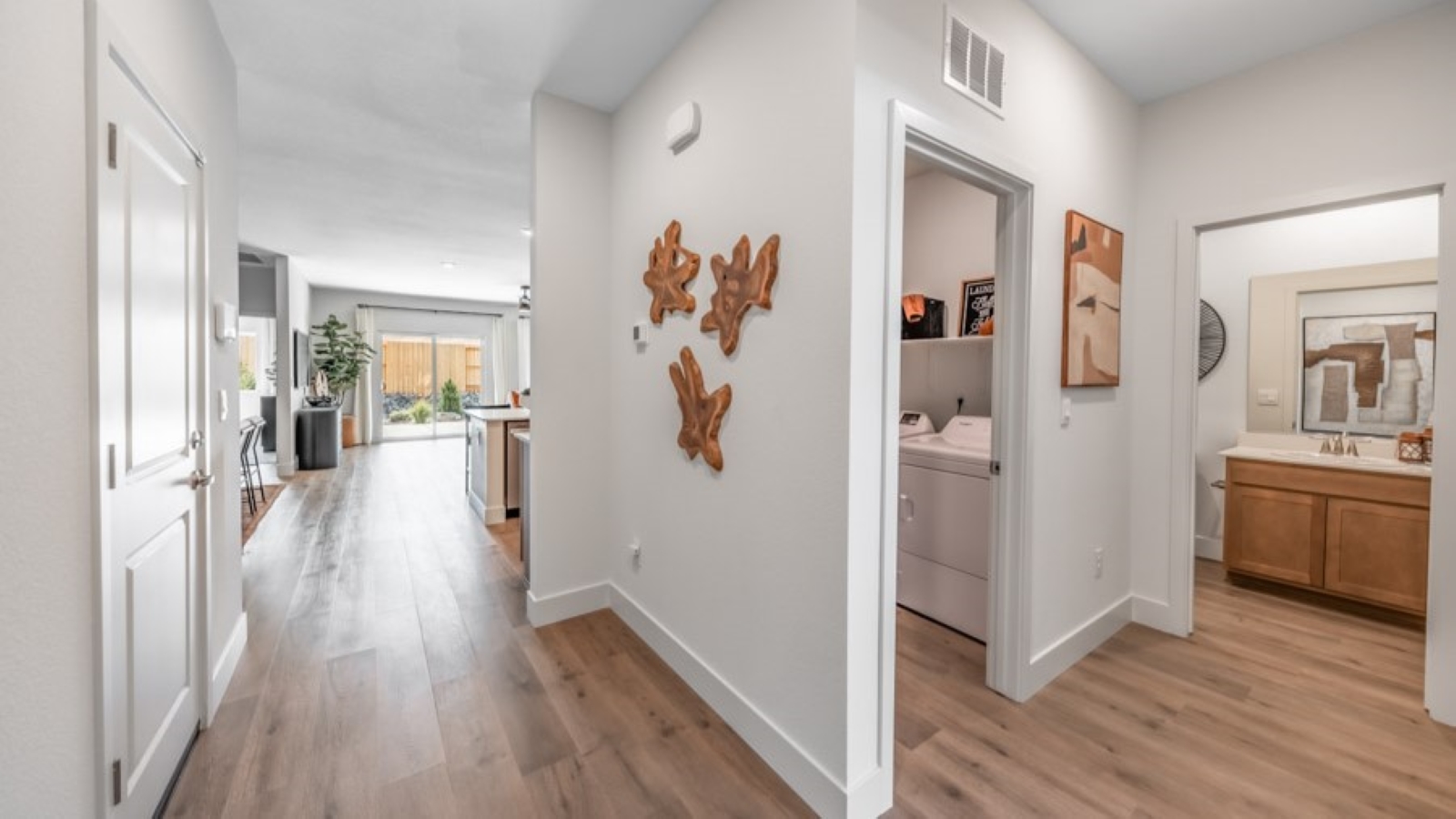 Entry to the Mammoth floorplan with a bedroom and bathroom at the front of the home