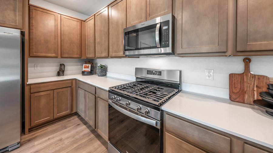 Stainless-steel appliances in modern kitchen