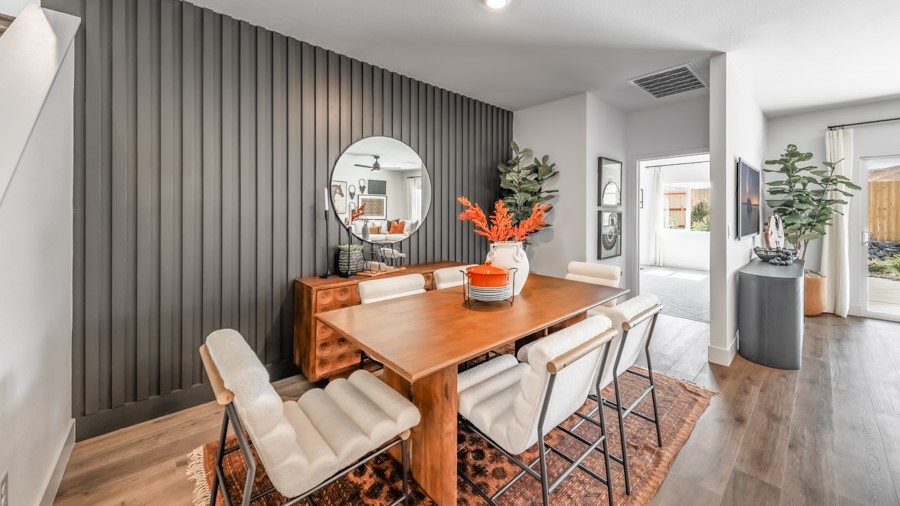 Dining table next to primary bedroom