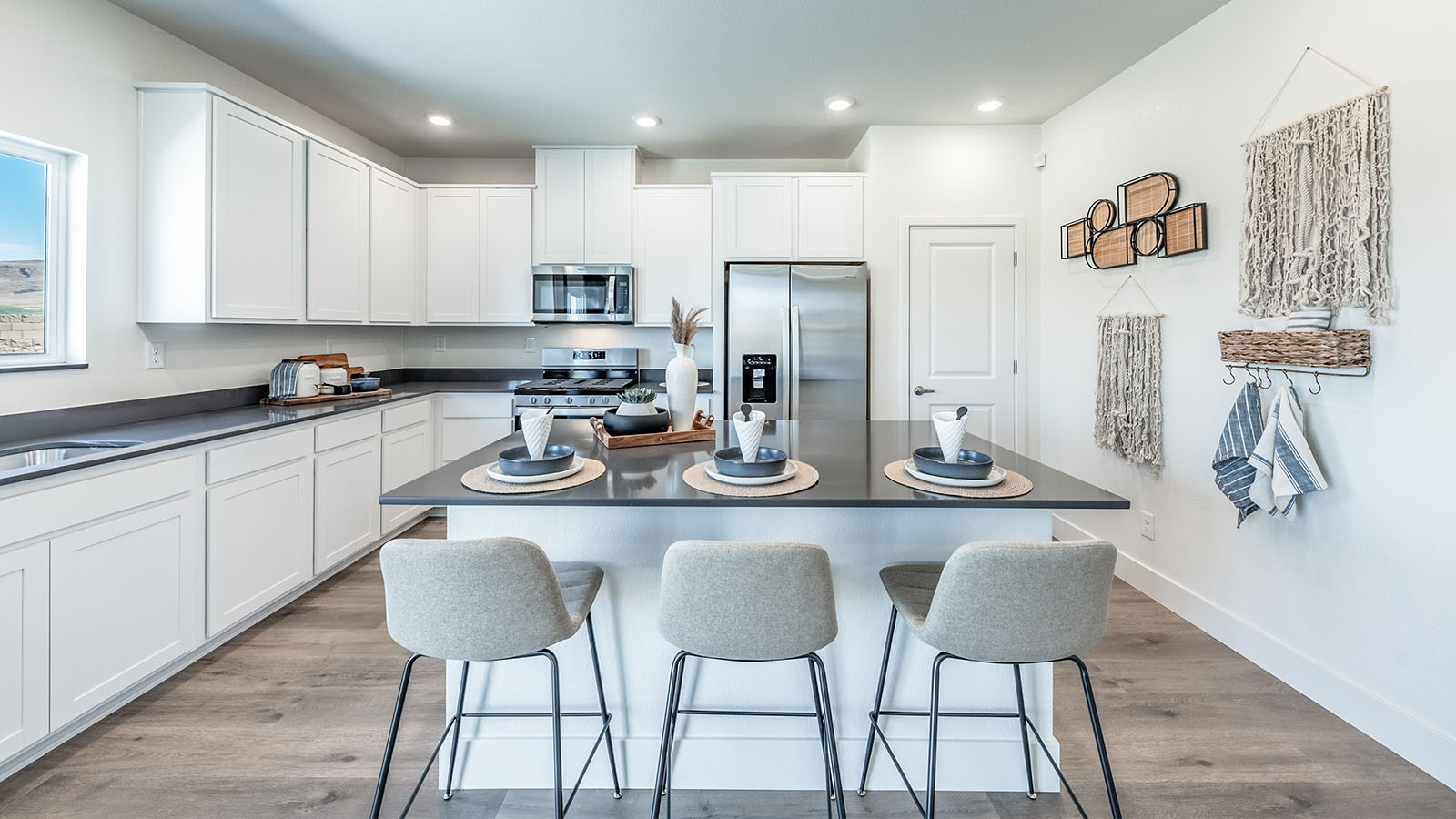 Modern kitchen with shaker-style cabinets and kitchen island with seating
