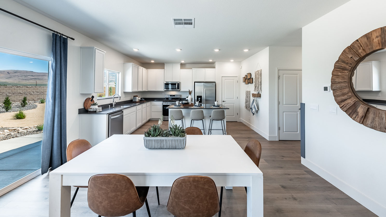 Open concept dining area next to kitchen