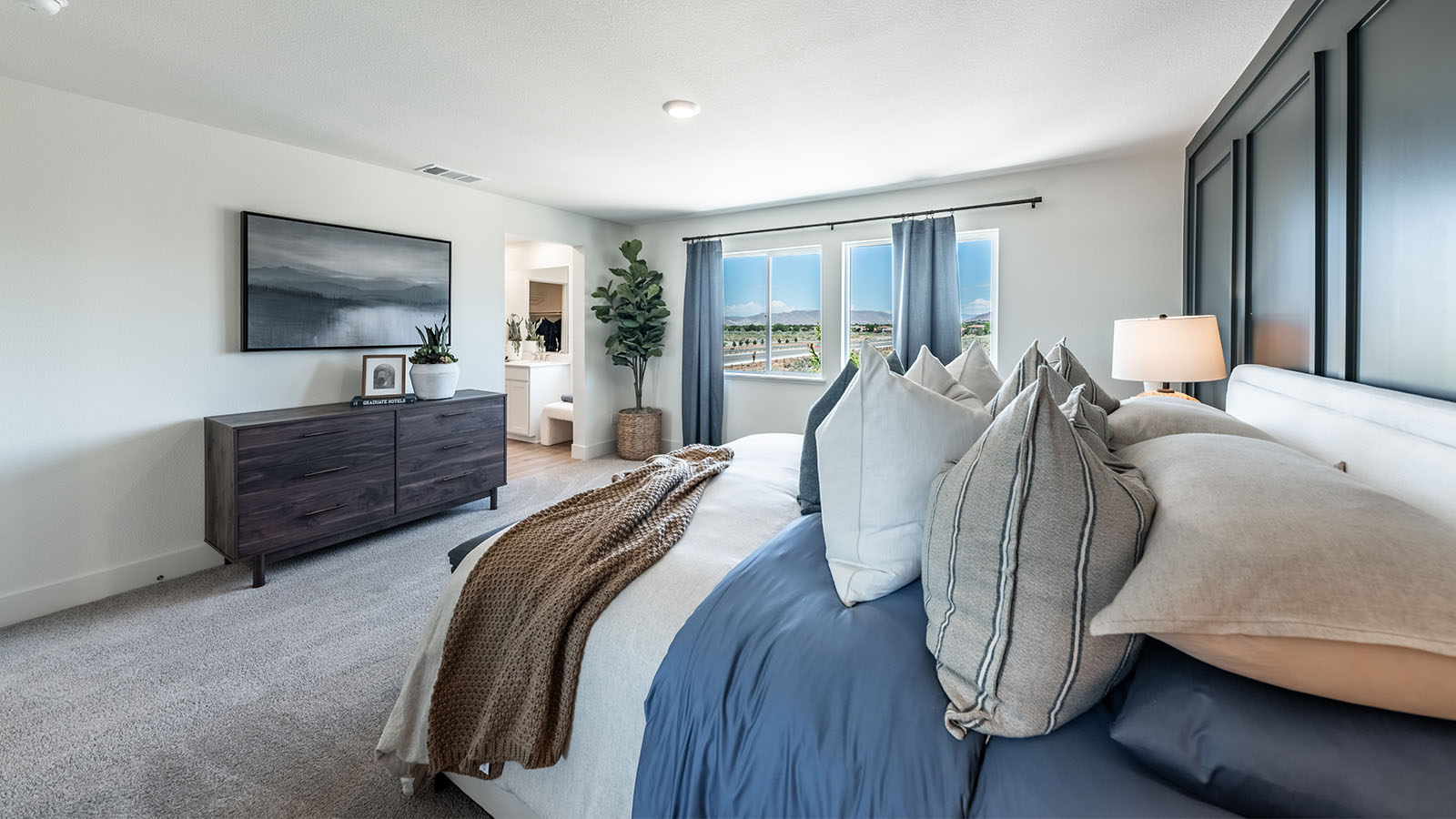 Primary bedroom with attached bathroom