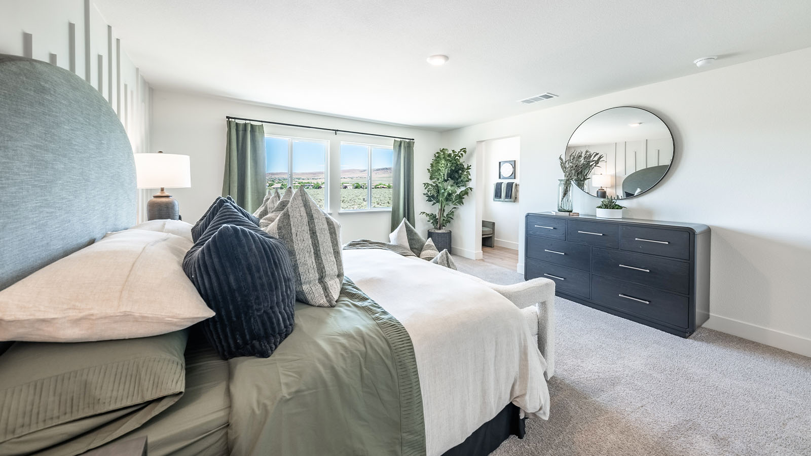 Primary bedroom with attached bathroom