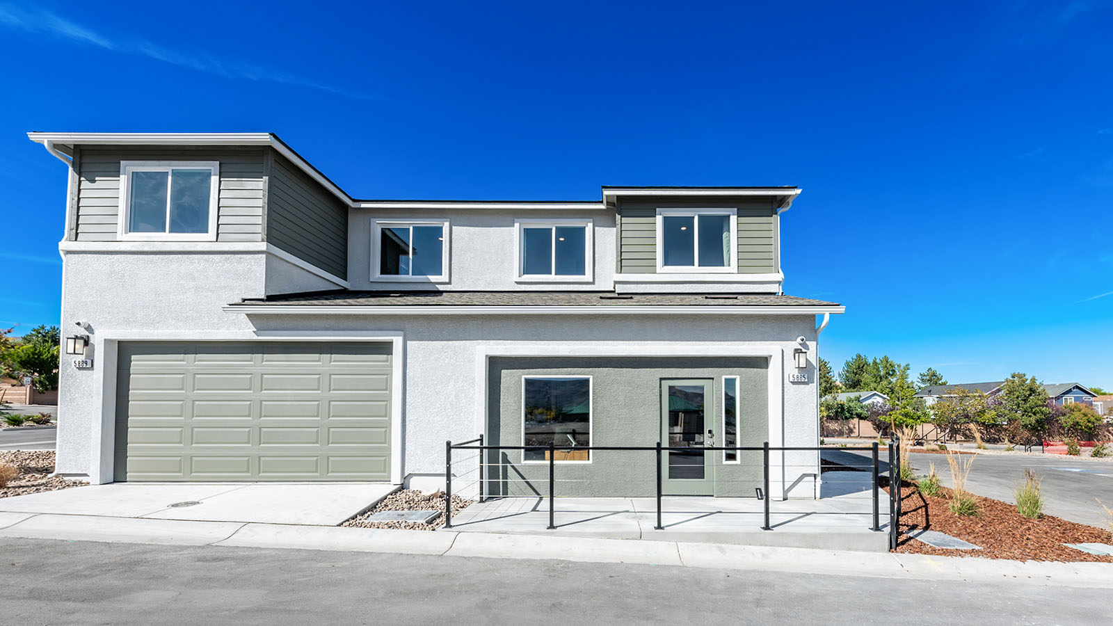 2 car garage entry behind home for the Walker floorplan