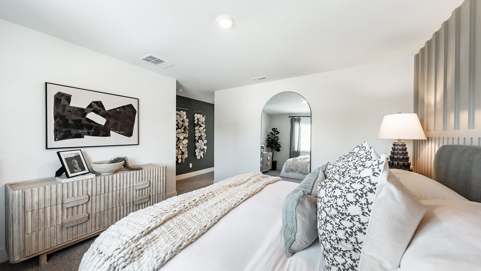 Primary bedroom with attached bathroom