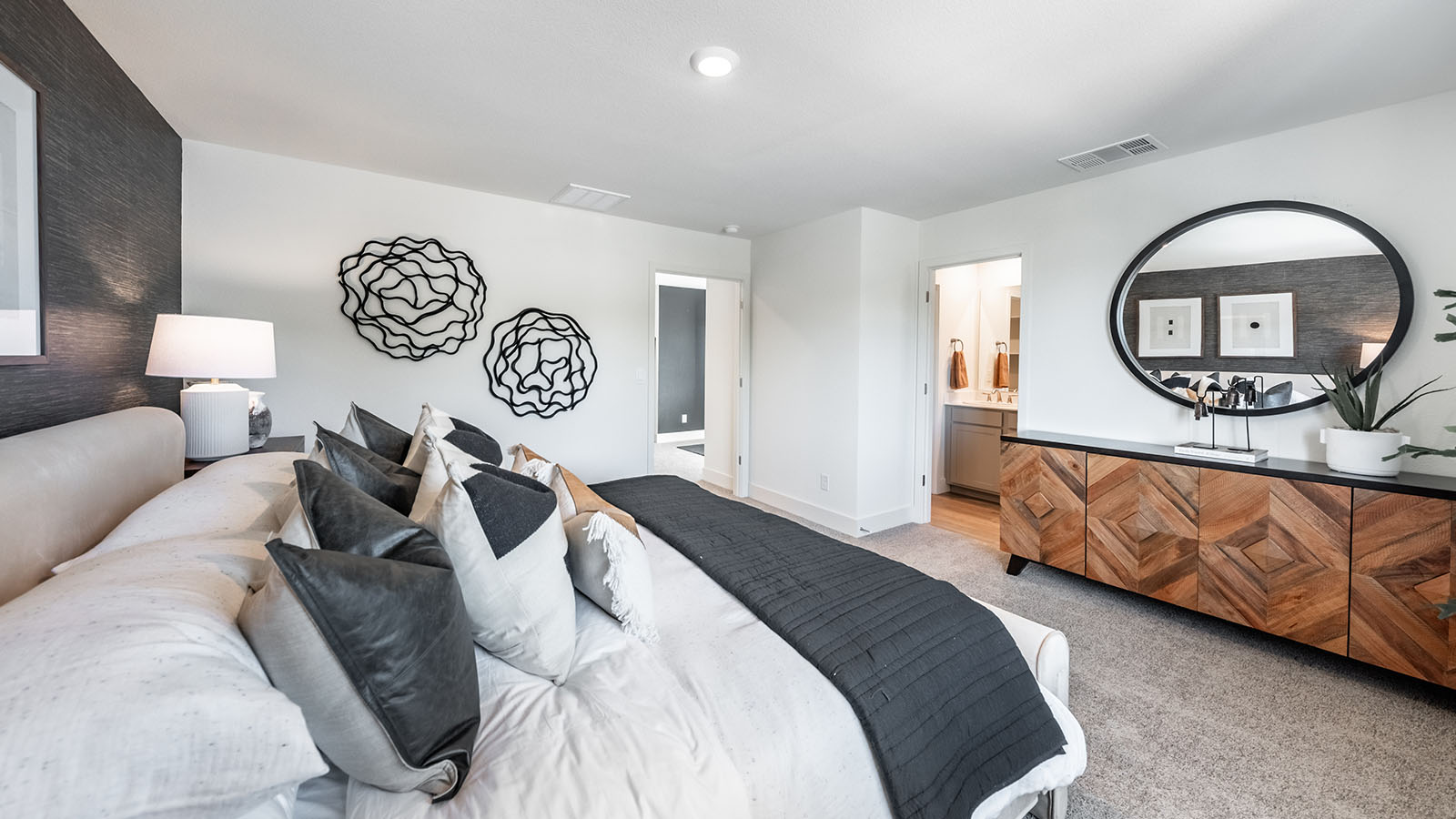 Primary bedroom with attached primary bathroom