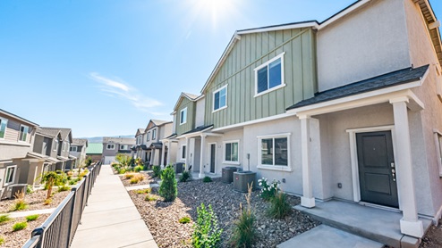 Neighborhood view of modern two-story townhomes at Monarch in Reno Nevada