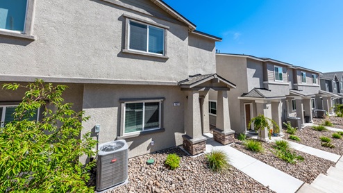 Neighborhood view of modern two-story townhomes at Monarch in Reno Nevada