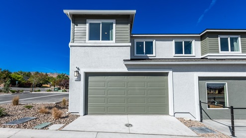 Modern two-story townhome model at Monarch community with garage