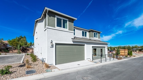 Modern two-story townhome model at Monarch community with garage