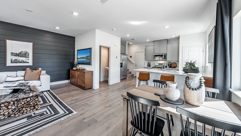 Open concept living room with accent wall in the Humboldt floorplan