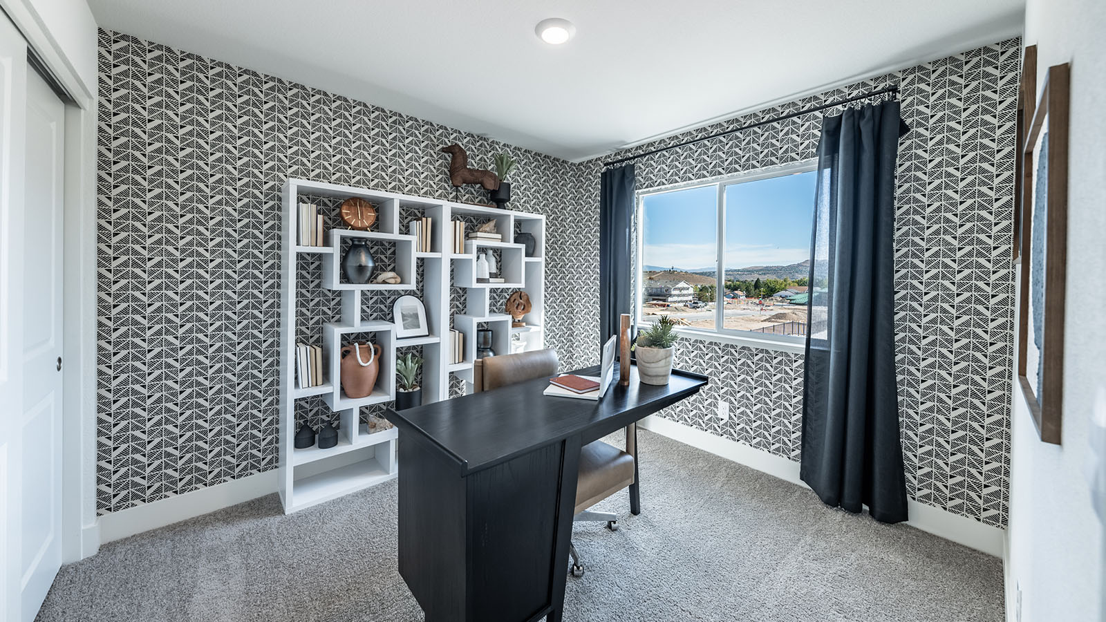 Office on second story with plenty of space and carpeted floors