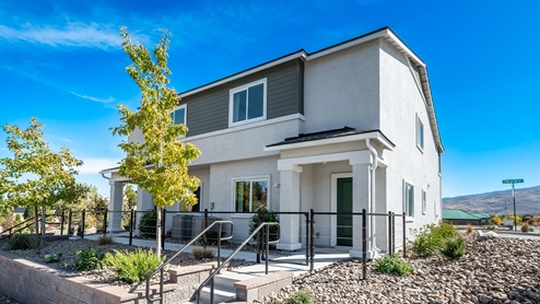 Modern two-story townhome model at Monarch community