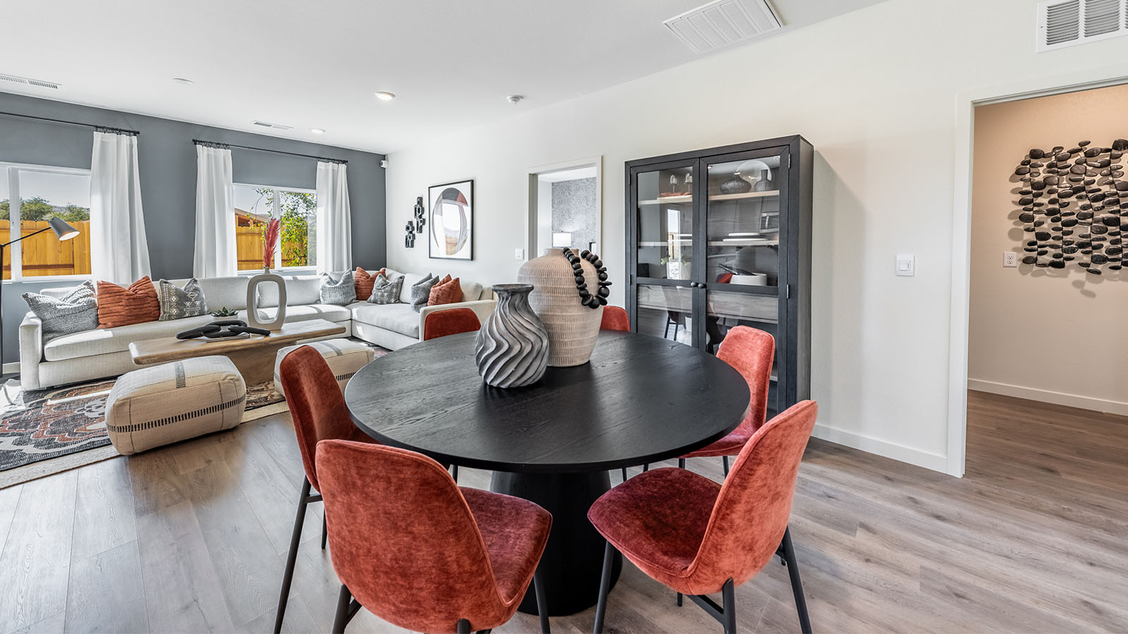 Dining space with room for a large table next to living area