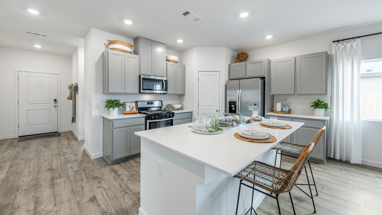 Modern kitchen with island and stainless steel appliances
