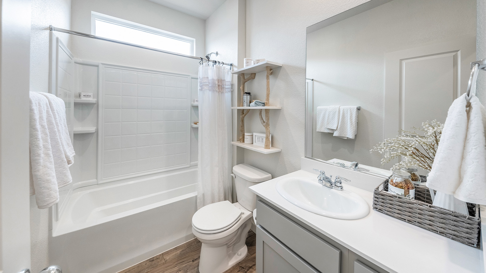 Secondary bathroom with bathtub and shower combo