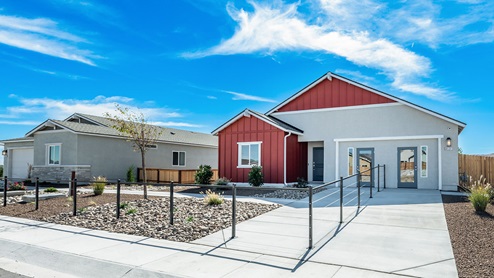 Two single-story Nevada Sky model homes with low-maintenance landscaping