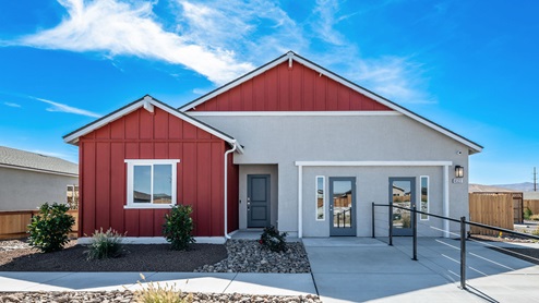 Topaz floorplan model home with stucco exterior with red board and batten accents