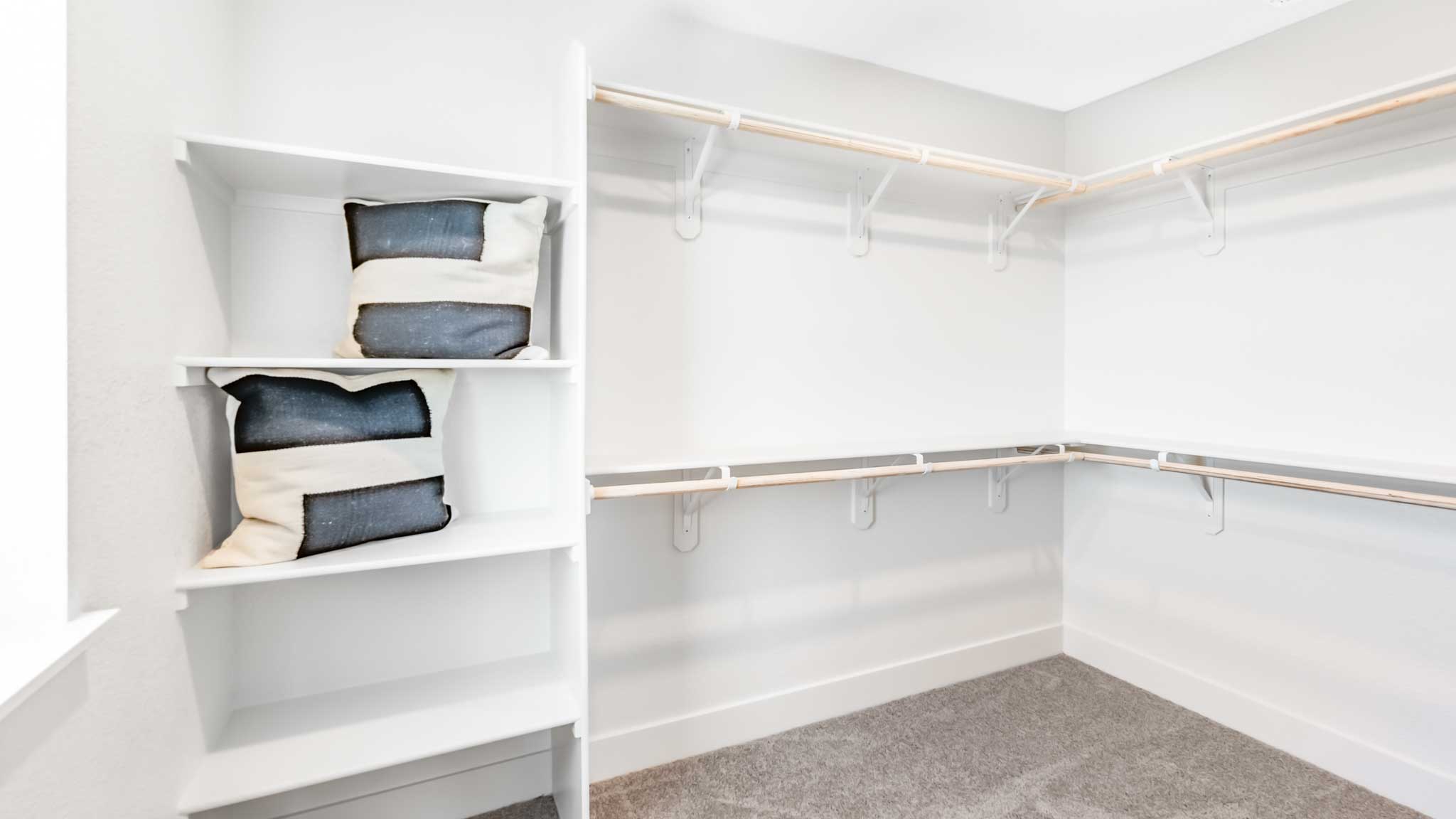 Large primary closet with shelving