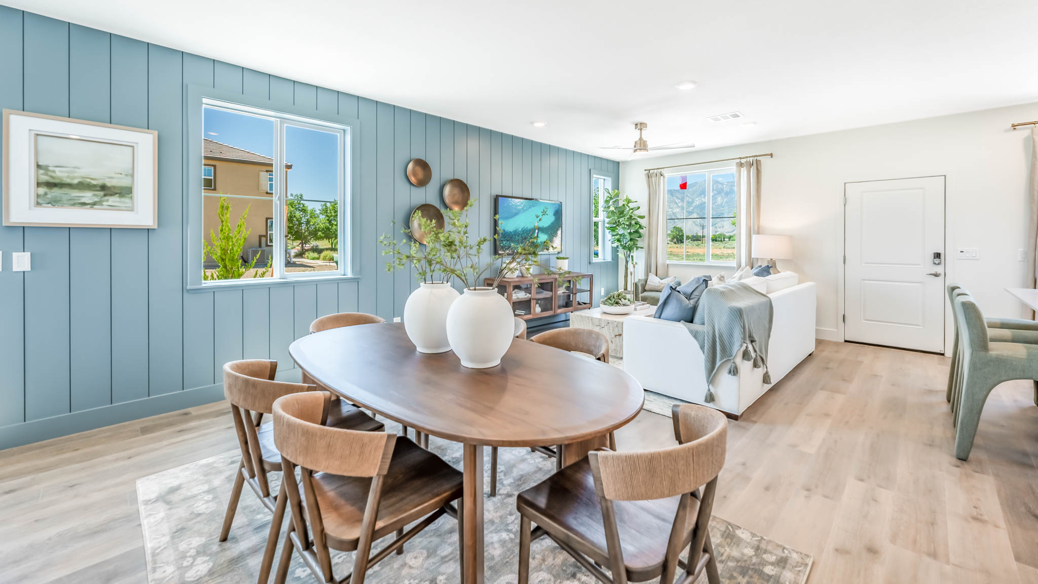 Dining area next to a blue accent wall