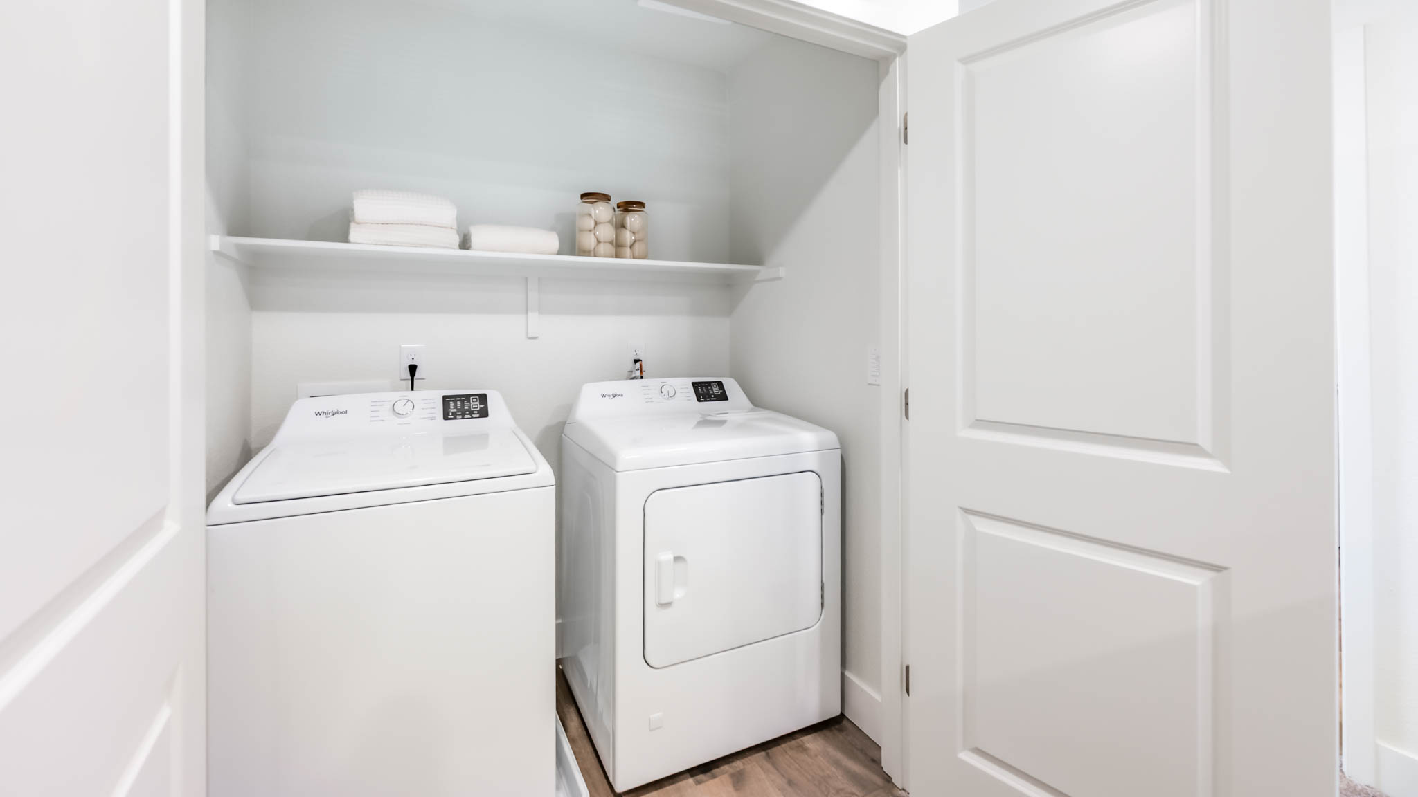 Laundry area with shelving