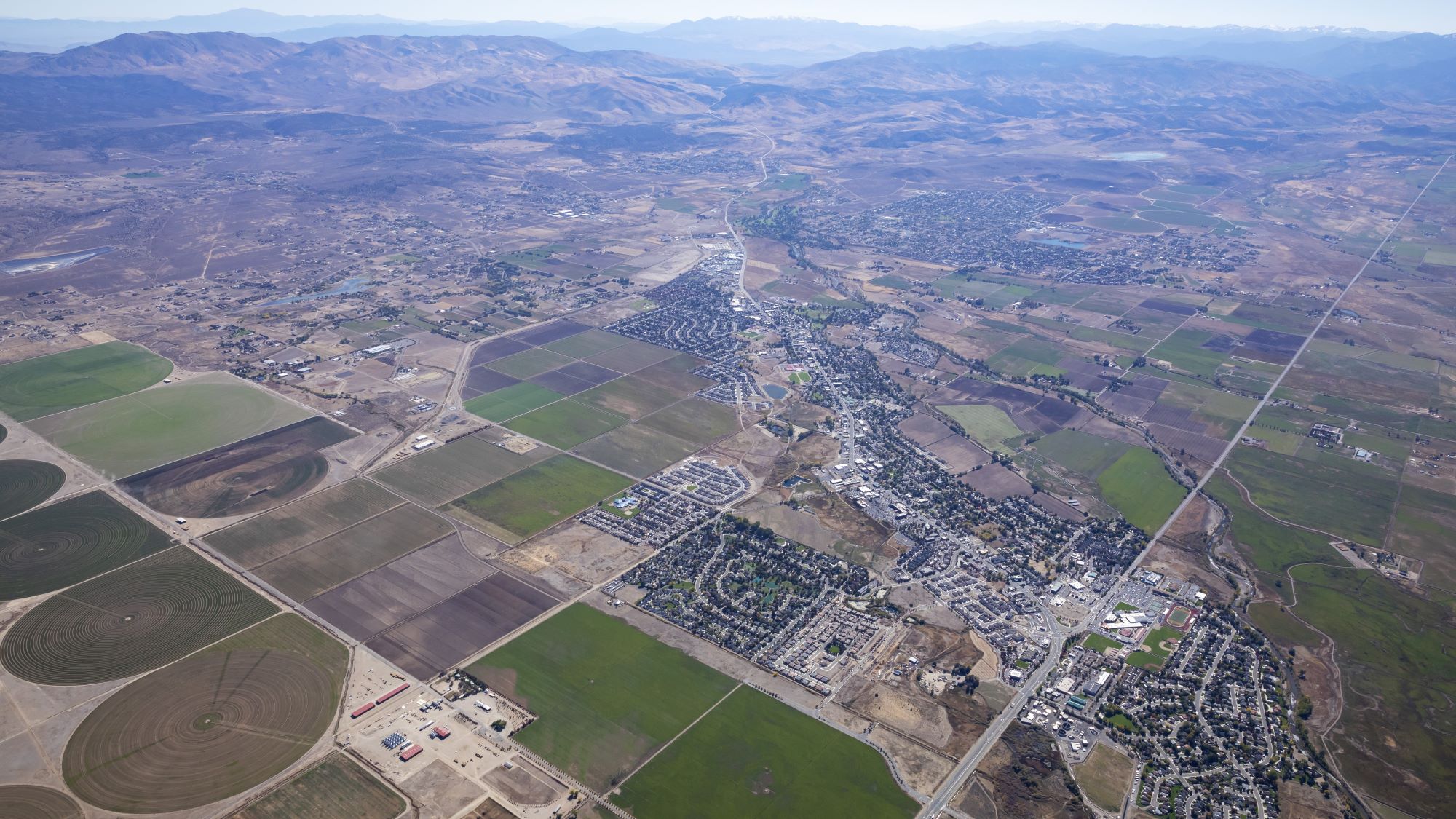 Aerial of Minden's farmland and mountains