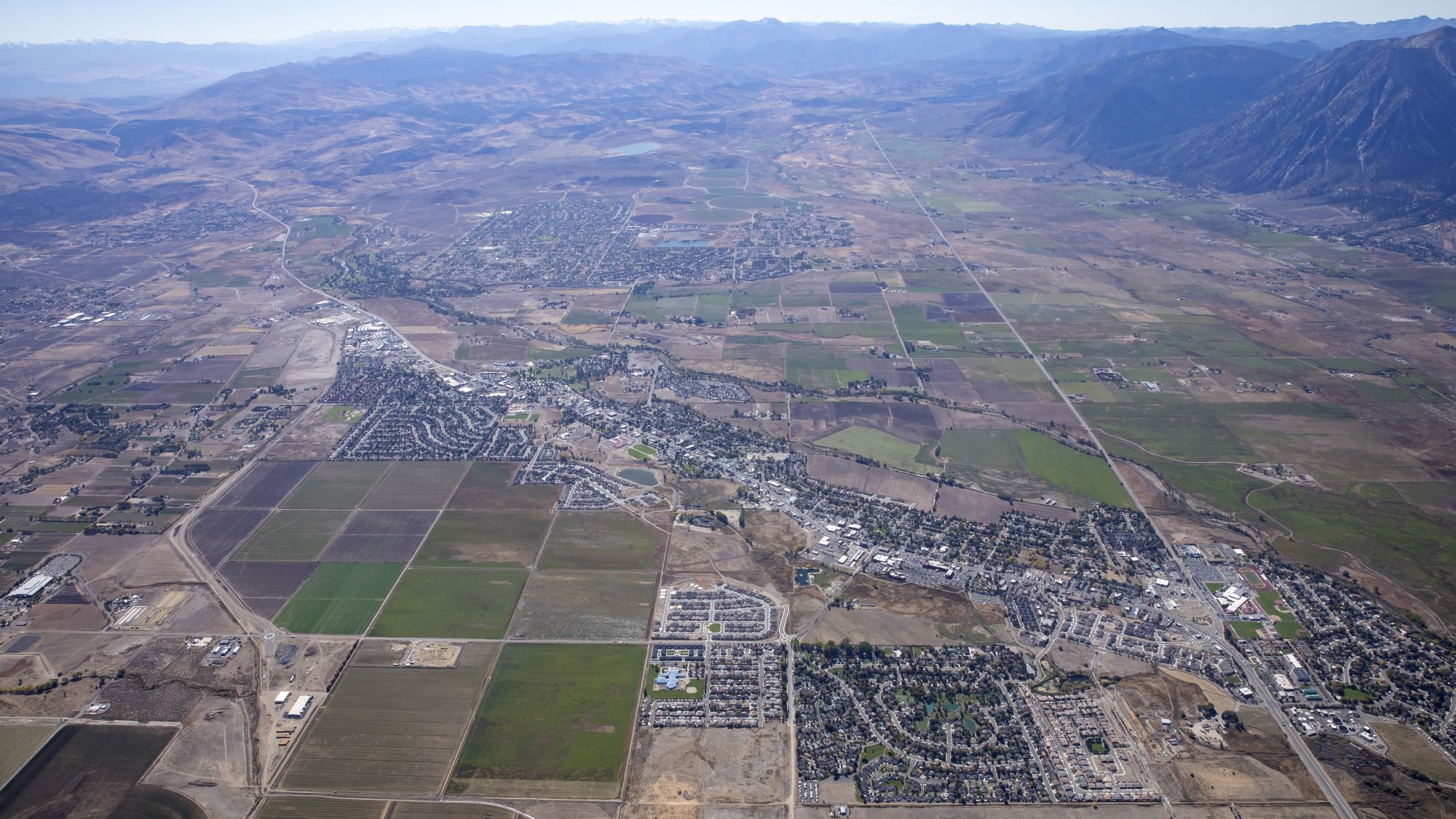 Aerial of Minden with mountains and farmland
