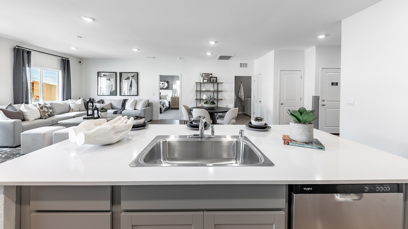 Kitchen island with sink and stainless steel dishwasher