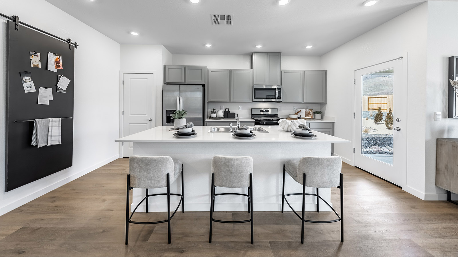 Kitchen island next to back patio door