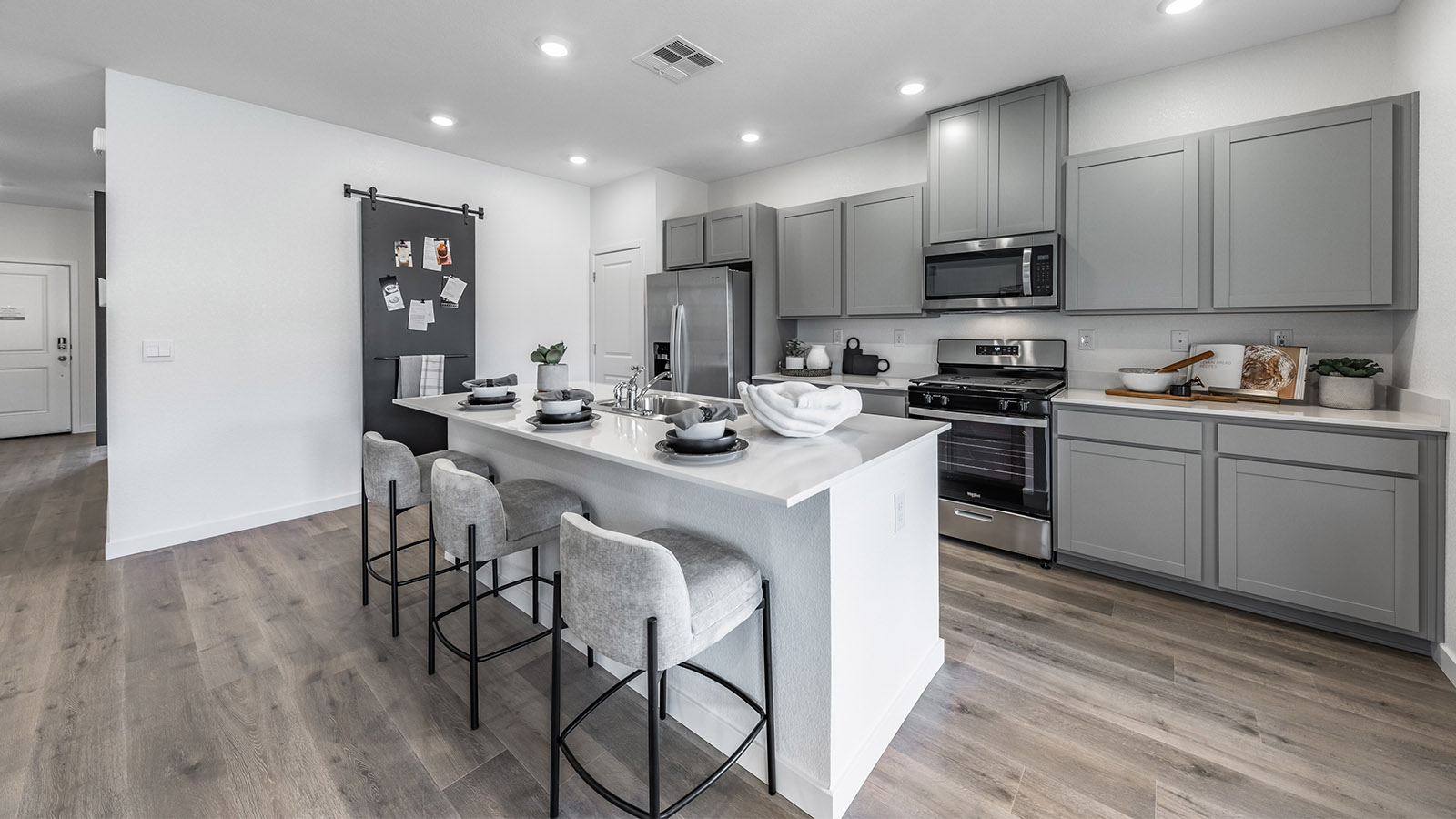 Kitchen island with light quartz countertops
