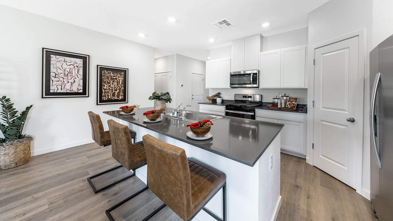 Kitchen island with dark countertops