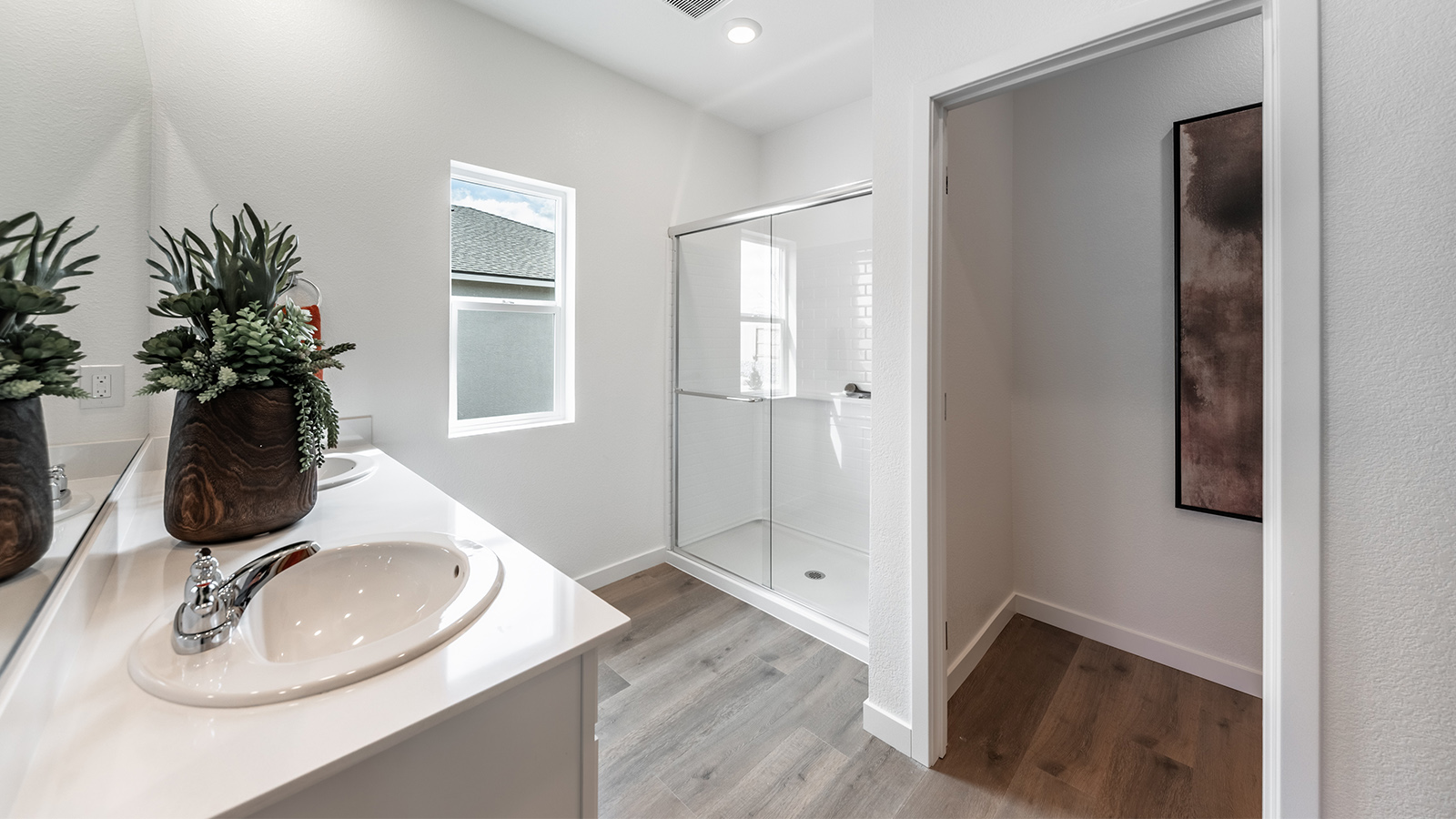Primary bathroom with walk-in shower and separate toilet
