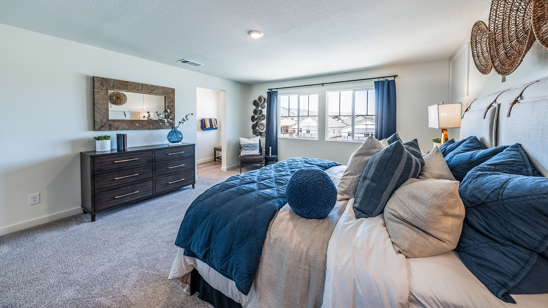 Bright primary bedroom with room for a large bed