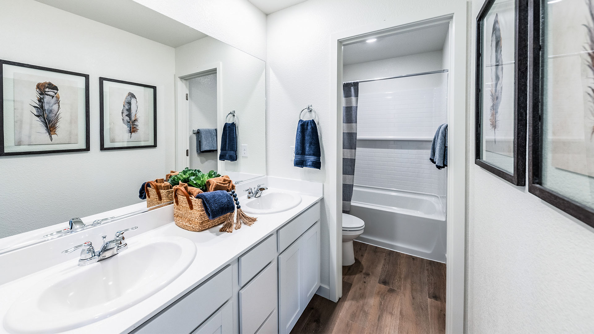 Secondary bathroom with separate room for toilet and bathtub and shower combo