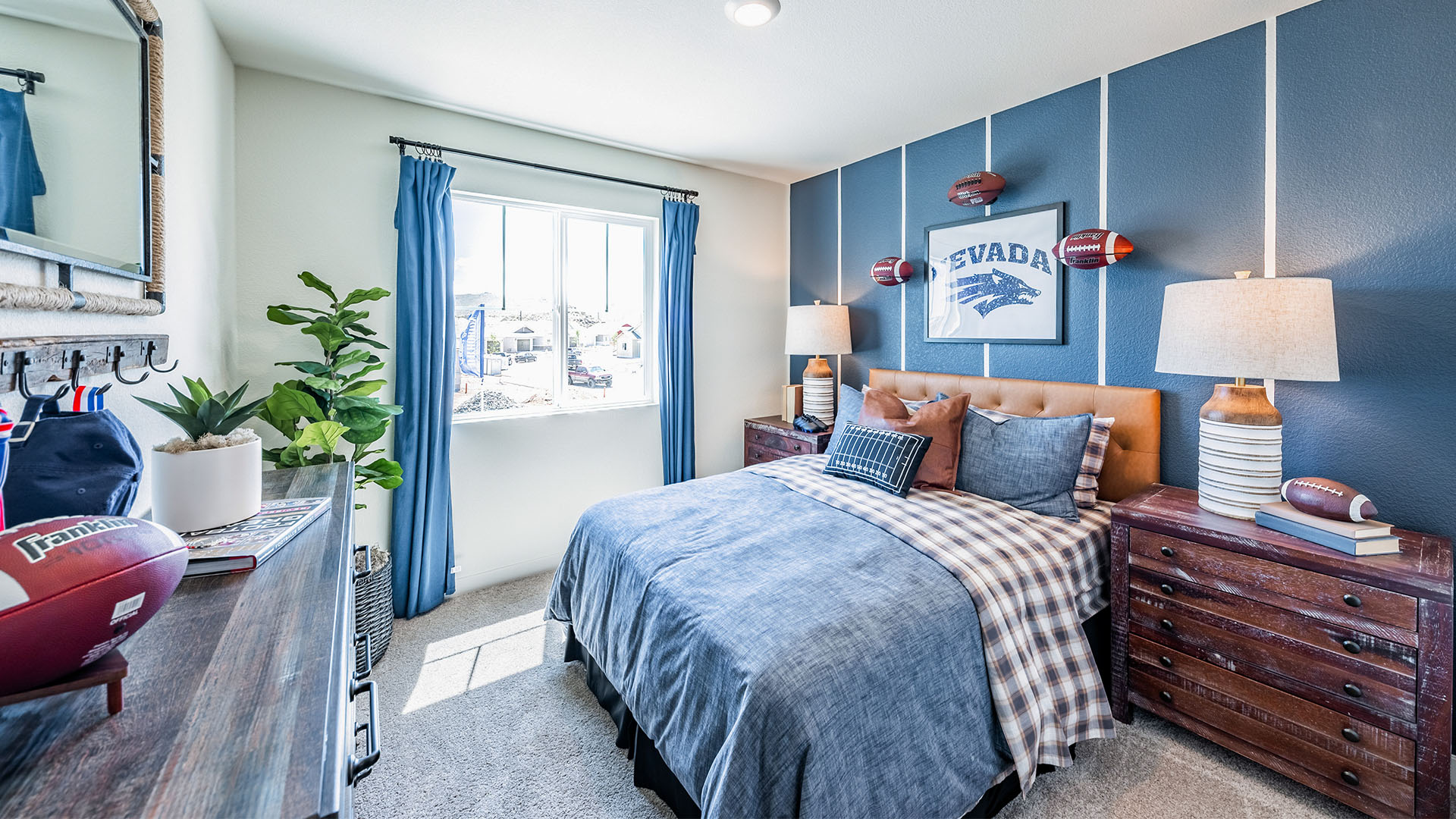 Kid's bedroom with carpeted floor and large window