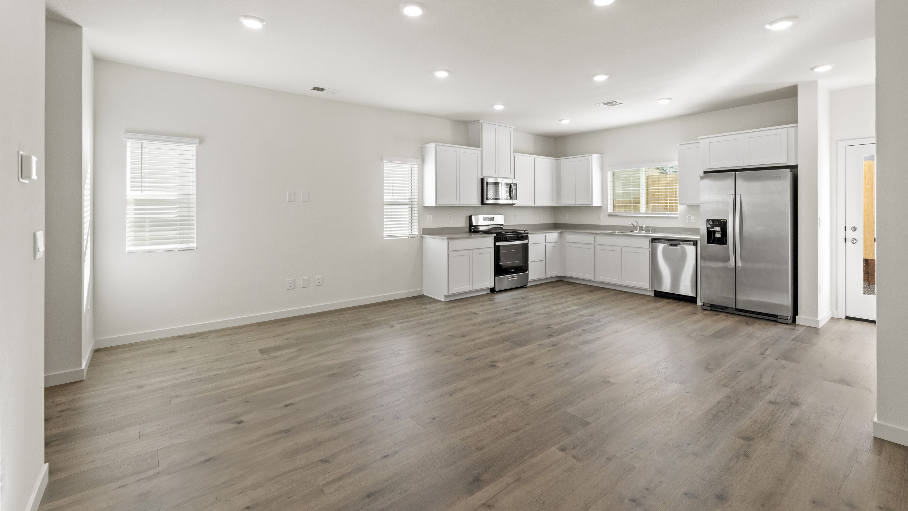 Great room looking towards kitchen and dining room