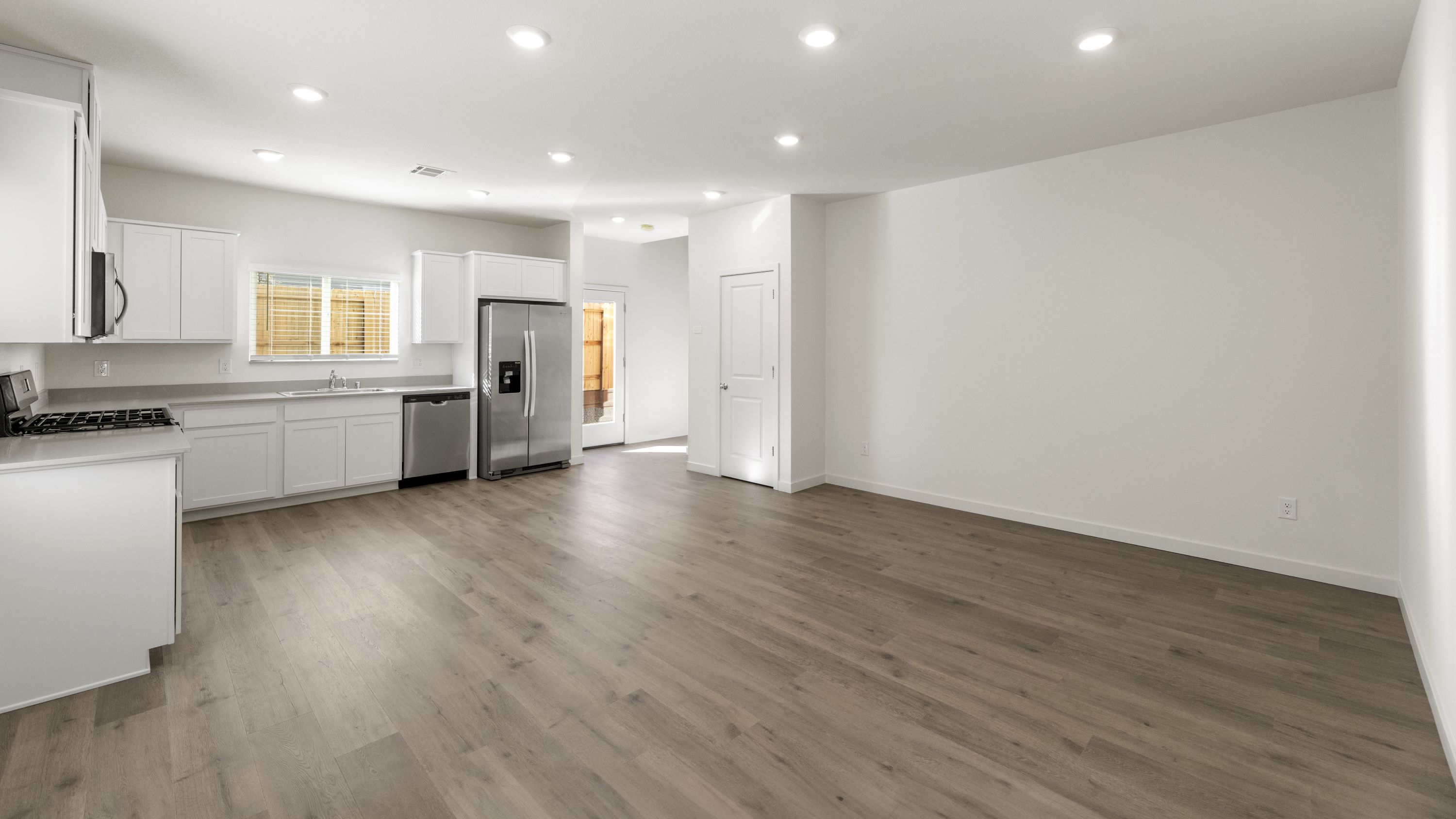 Spacious living room with large windows