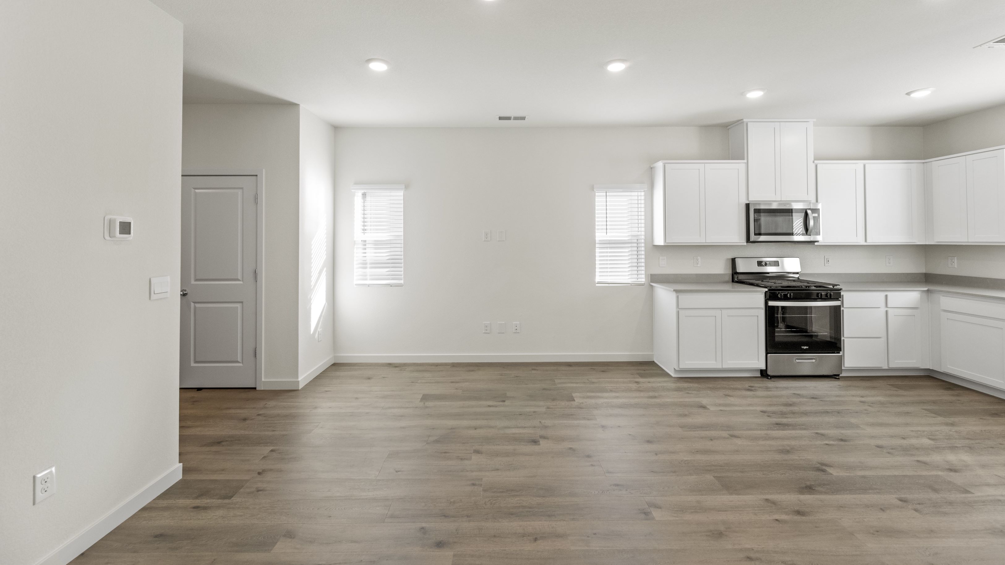 Bright open-concept living, dining and kitchen