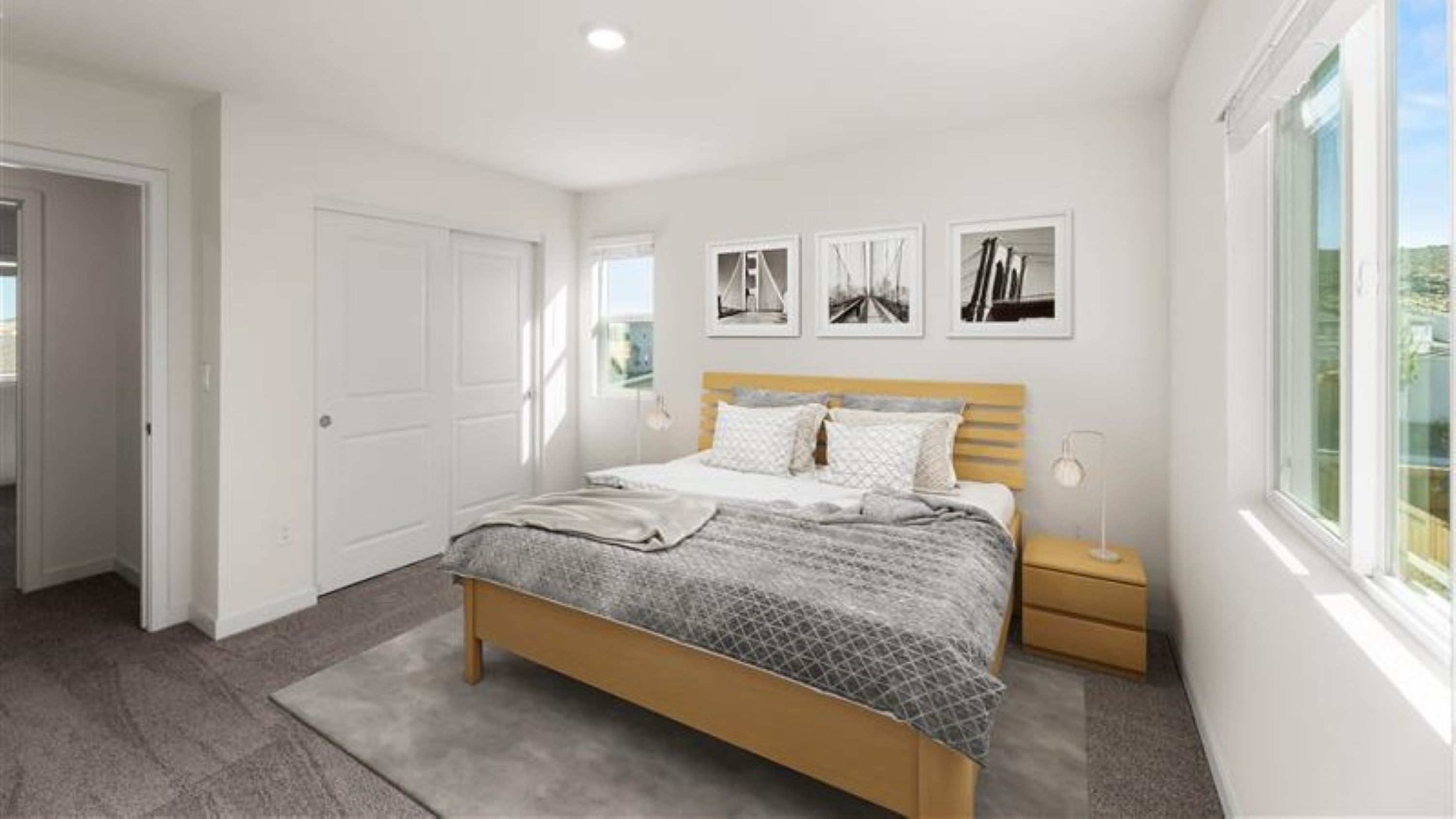 Virtually staged primary bedroom with carpeted floor and attached bathroom