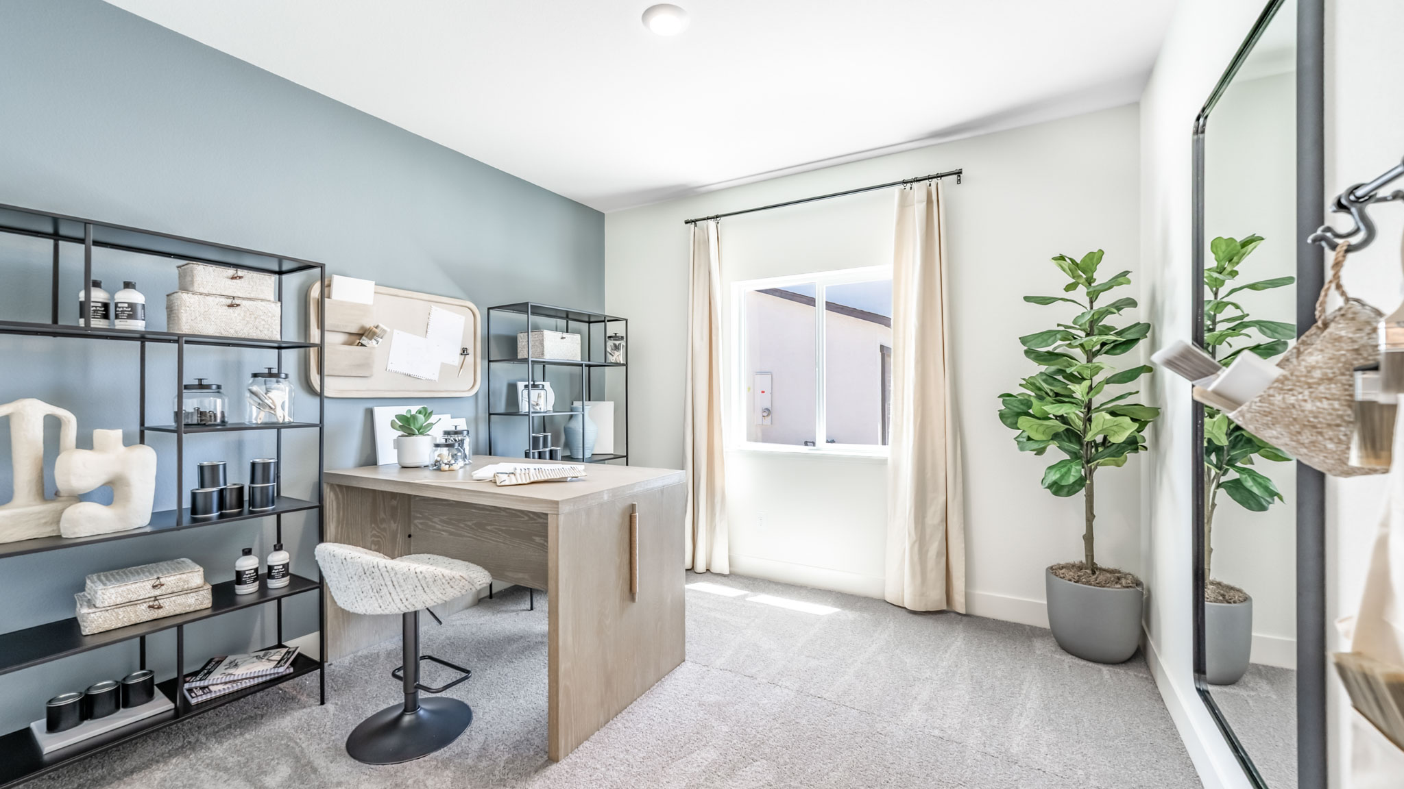 Secondary bedroom decorated as an office space