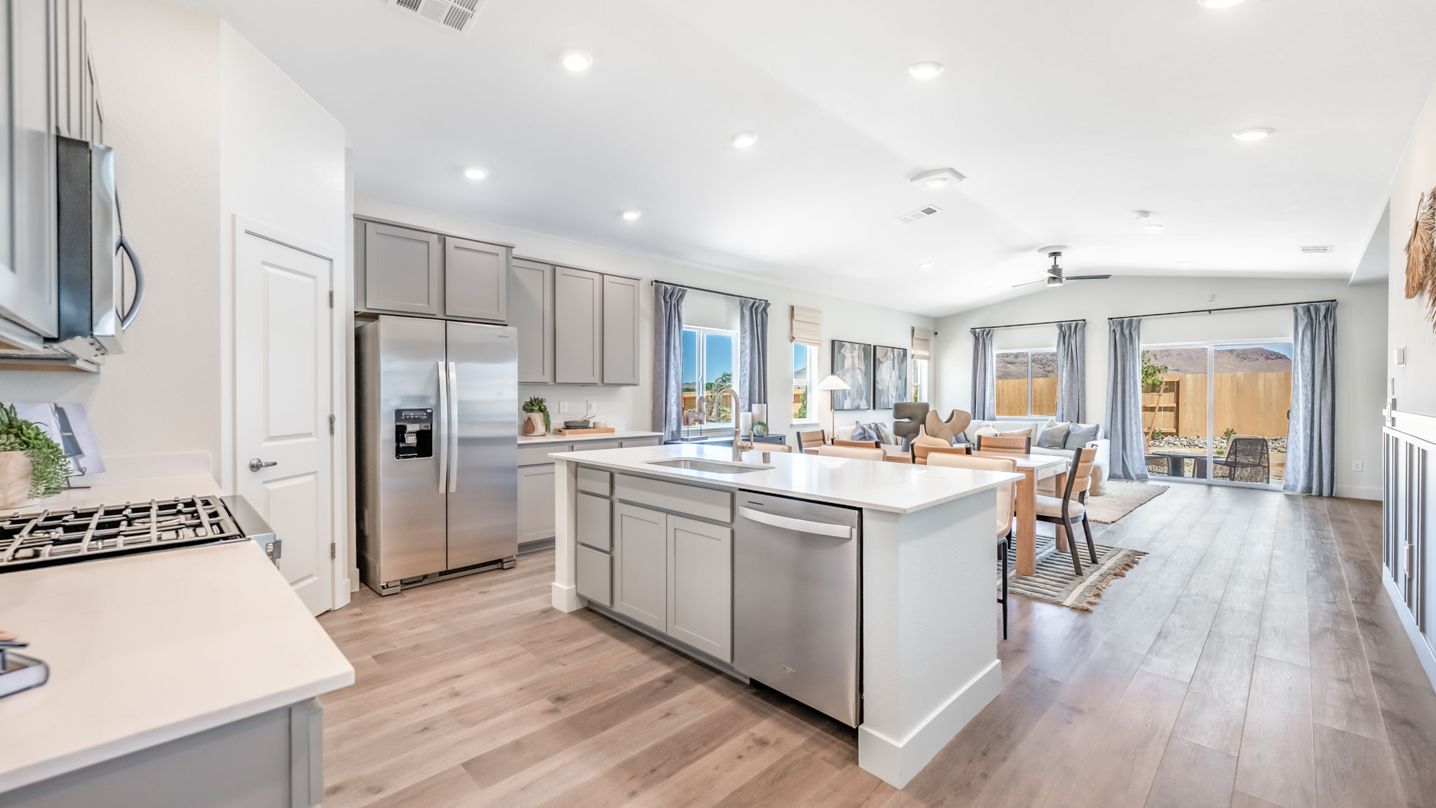 Entry into the kitchen and open concept great room