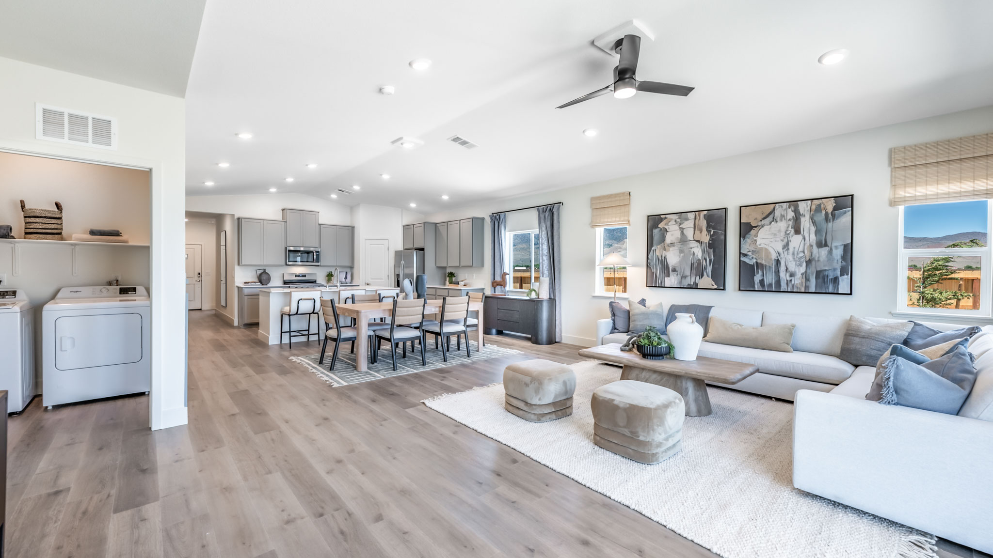 Open concept living room, dining area, and kitchen
