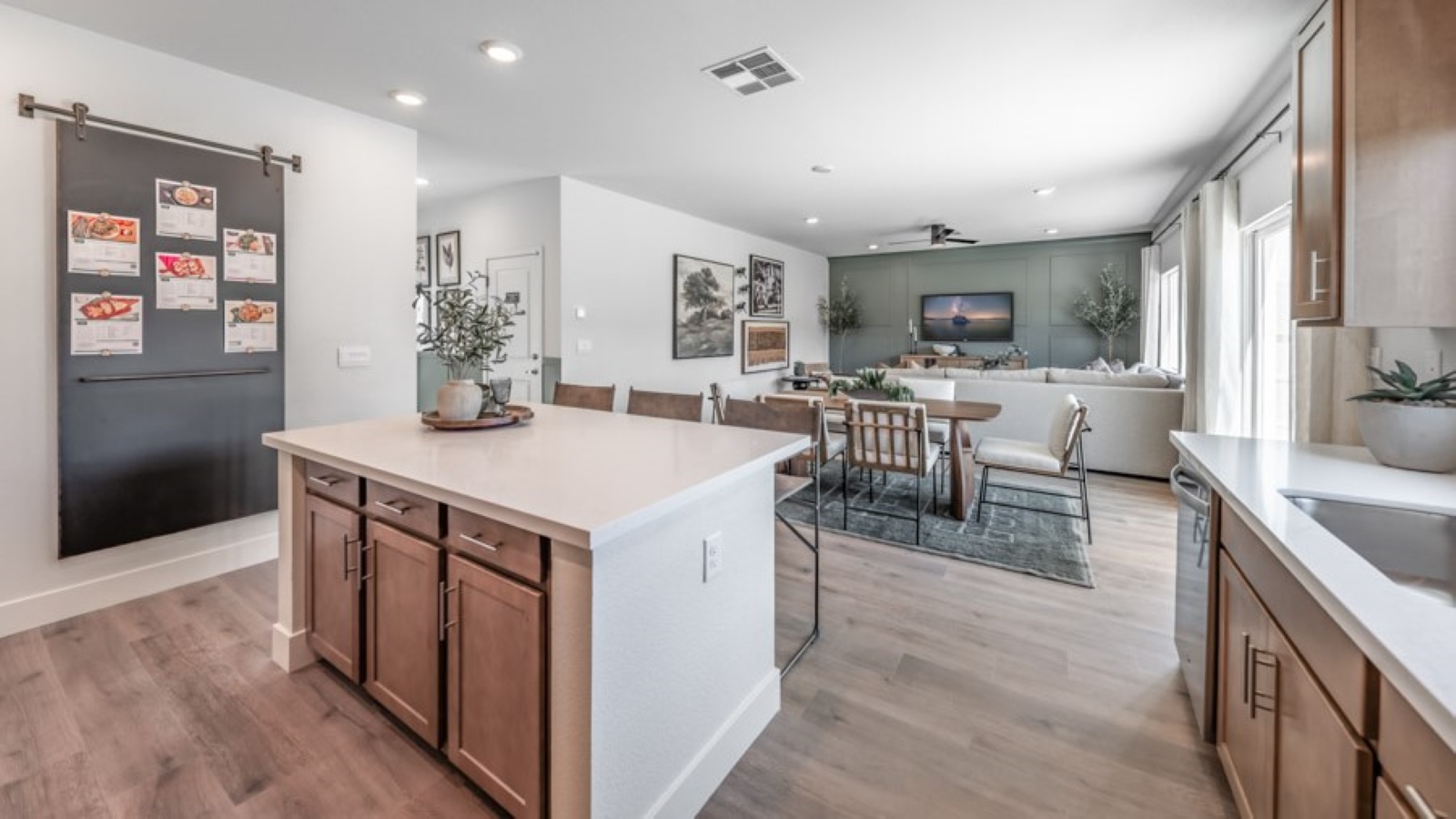 Large kitchen space with island and pantry